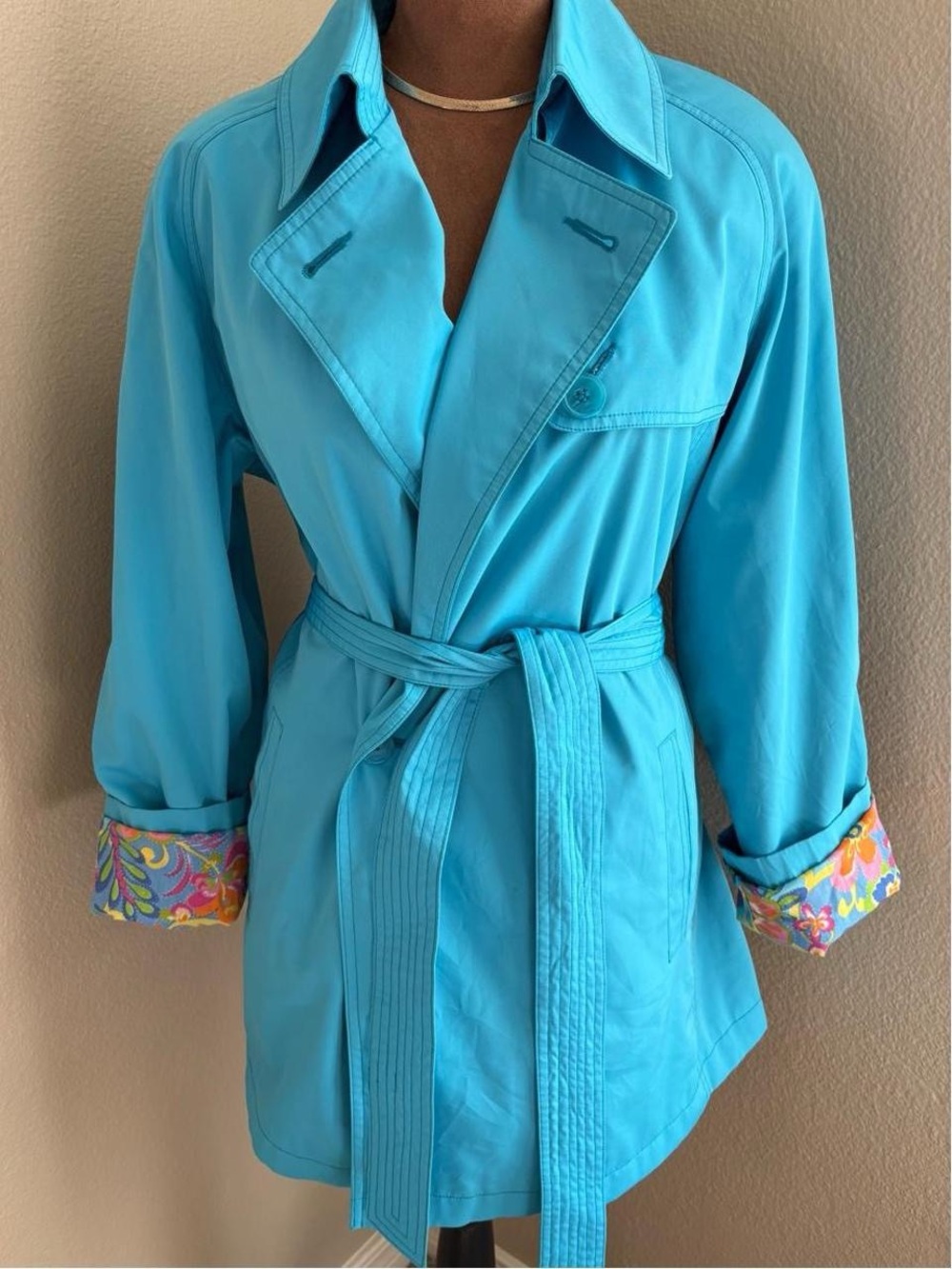 Vintage Panché blue trench coat with colorful floral design, size M